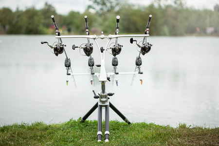 Carp fishing rods set up on holderの写真素材