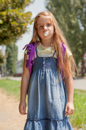 schoolgirl go to school outdoorsの写真素材