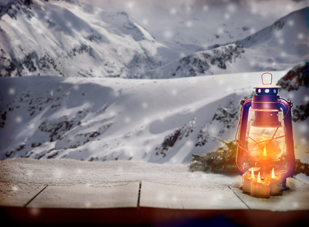 winter time and white lamp on white retro deskの写真素材