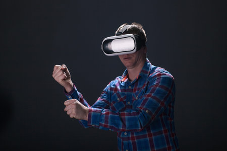 Man wearing virtual reality glasses,studio shot