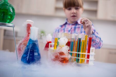 Portrait of  schoolgirl in chemistry labの写真素材