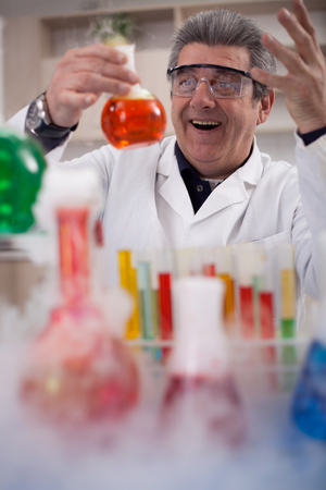 Scientist hand holding sample in special laboratoryの写真素材