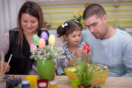 easter eggs painted by the  familyの写真素材