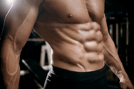 Athletic Strong Sexual Man Abs Six Pack Muscles Bodybuiding And Fitness Conceptの写真素材