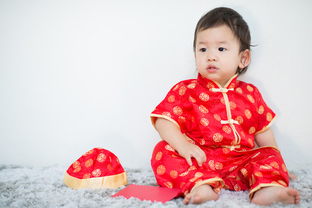 Cute baby in chinese dressの写真素材
