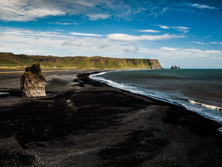 Typical south icelandic view - black sand beach