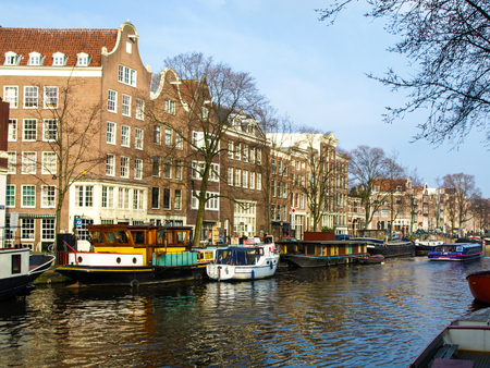 Canal and houseboats in Amsterdam centre, Netherlandsの写真素材