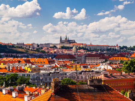 Hradcany and Prague Castle - view over rooftops from Vysehrad (Czech Republic)の写真素材