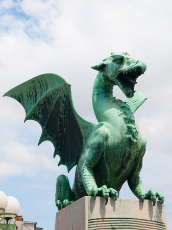 Famous statue of dragon on a Dragon bridge in Ljubljana, Sloveniaの写真素材