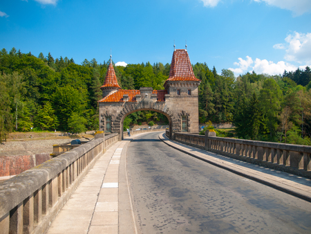 Fairytale dam Les Kralovstvi with nice towers in sunny day, Czech Republicの写真素材