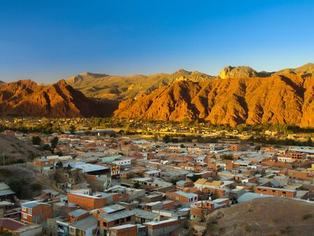 View of houses in Tupiza and red mountains on a background, Boliviaの写真素材