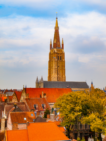 Gothic tower of Church of Our Lady in Bruges is the second tallest brickwork tower in the world.の写真素材