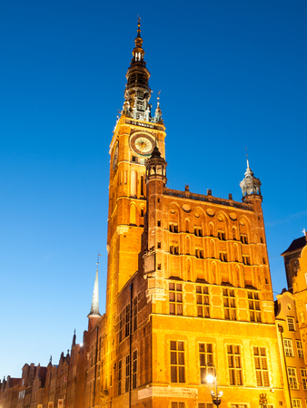 GDANSK, POLAND - CIRCA 2014: Illuminated Town Hall in Old Town of Gdansk, Poland. Night shot of beautiful baroque clock tower of Gdansk Town Hall.のeditorial素材