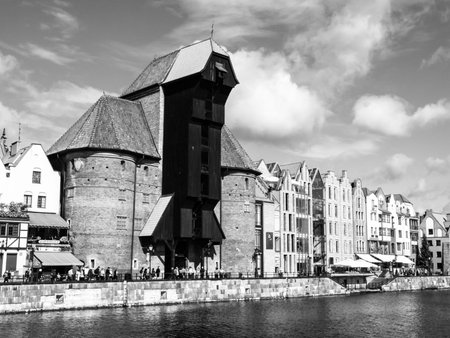 The medieval crane at Motlawa river in Old Town of Gdansk, Poland. Black and white image.