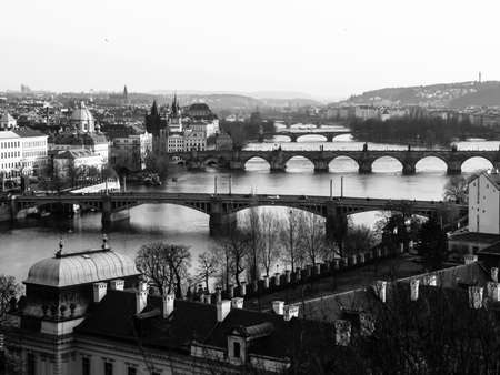 Prague bridges over Vltava river at sunset time. View from Letna park, Czech Republic. Black and white image.の写真素材