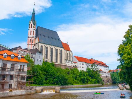 St. Vitus Church above Vltava River in Cesky Krumlov, Czech Republicの写真素材