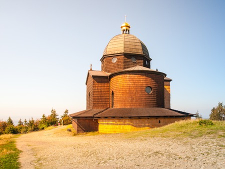 Wooden Chapel of St. Cyril and St. Methodius on the top of Radhost Mountain in Beskids, aka Beskydy Mountains, Moravia, Czech Republicの写真素材