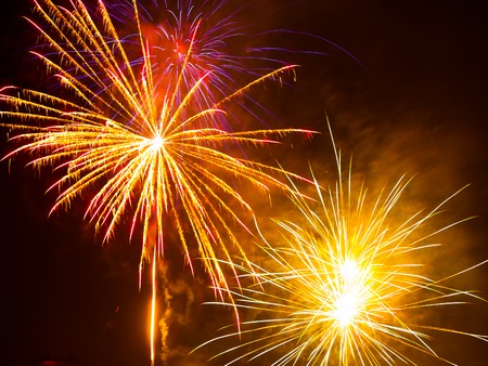 Colorful fireworks in the night sky. Happy new year celebration abstrackt background.の写真素材