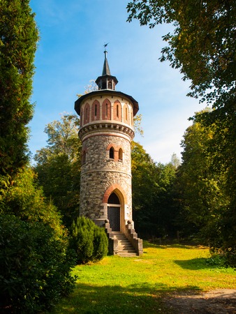 Romantic rounded waterworks tower in the park near Sychrov Castle, Czech Republic, Europe.の写真素材