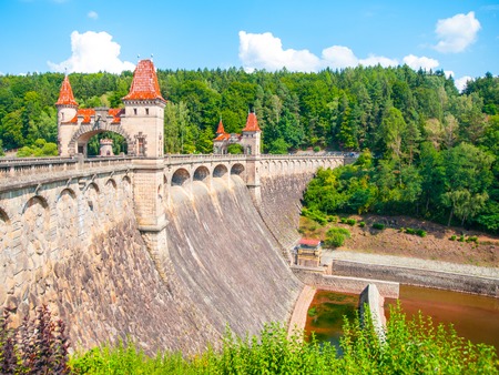Fairytale dam Les Kralovstvi with picturesque towers on sunny summer day, Czech Republic.の写真素材