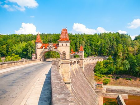 Fairytale dam Les Kralovstvi with picturesque towers on sunny summer day, Czech Republic.の写真素材