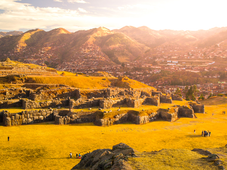 Fort Sacsayhuaman and Cuzco city on backgroudn on sunny day, Peru.の写真素材
