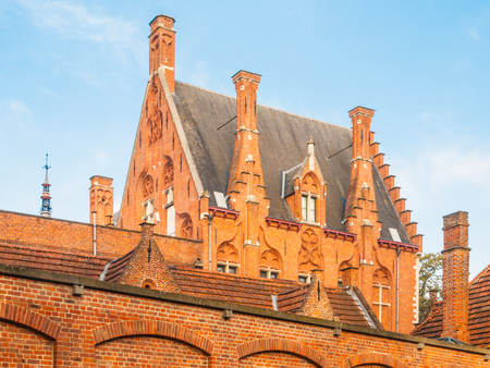 Historical brick building of Minnewater hospital in Bruges, Belgium.の写真素材