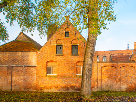 Historical brick building of Minnewater hospital in Bruges, Belgium.の写真素材