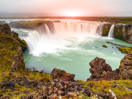 Godafoss waterfall at sunset time, northern Iceland.の写真素材