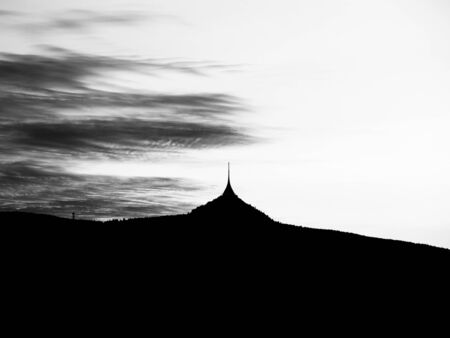 Silhouette of Jested mountain at sunset time, Liberec, Czech Republic. Black and white image.の写真素材