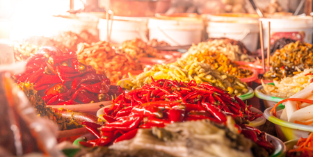 Dry red chili peppers in the oriental market.の写真素材
