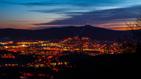 Evening view of illuminated Liberec city and Jested Mountain. Night scene.の写真素材