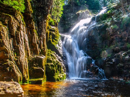 Kamienczyk waterfall near SzklarskaPoreba in Giant mountains or Karkonosze, Poland. Long time exposure.の写真素材