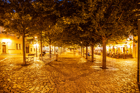 PRAGUE, CZECH REPUBLIC - AUGUST 17, 2018: Evening on Kampa Island with cobbled street illuminated by streer lamps. Prague, Czech Republic.のeditorial素材