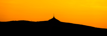 Silhouette of Jested mountain at sunset time, Liberec, Czech Republic. Panoramic shot.の写真素材