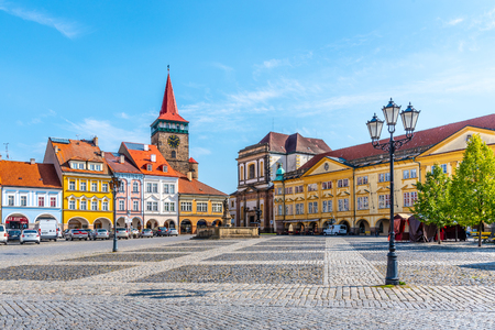 JICIN, CZECH REPUBLIC - SEPTEMBER 28, 2018: Colorful renaissance houses and Valdice Gate at Wallenstein Square in Jicin, Czech Republic.のeditorial素材