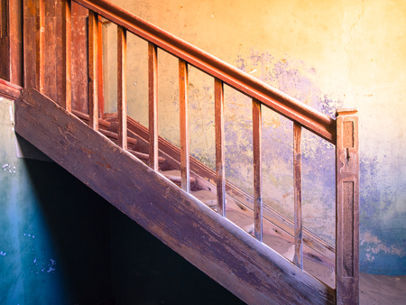 Old staircase in ruined and abandoned house. Kolmanskop, Namibia.の写真素材