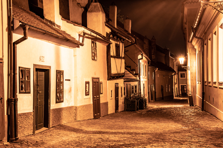Small medieval houses in Golden Lane by night,  Czech Republic.の写真素材