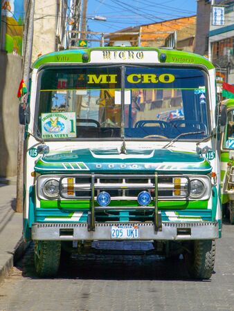 LA PAZ, BOLIVIA - JULY 21, 2008: Front view of old green Dodge micro bus in streets of La Paz, Bolivia.のeditorial素材