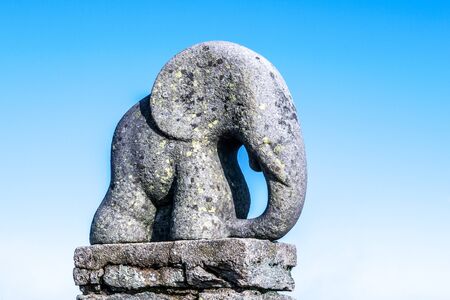 KRALICKY SNEZNIK, CZECH REPUBLIC - OCTOBER 29, 2011: Young elephant granite sculpture on Kralicky Sneznik Mountain, Czech Republic.のeditorial素材