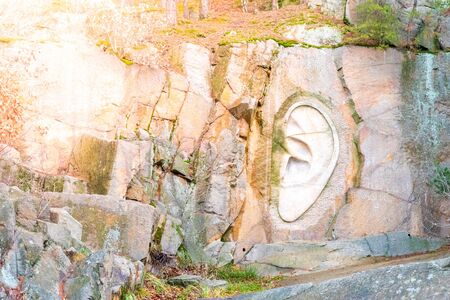 LIPNICE NAD SAZAVOU, CZECH REPUBLIC - DECEMBER 31, 2018: Bretschneiders Ear scuplture in old granite rock quarry near Lipnice Castle.のeditorial素材