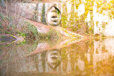 LIPNICE NAD SAZAVOU, CZECH REPUBLIC - DECEMBER 31, 2018: Mouth of Truth scuplture in old granite rock quarry near Lipnice Castle.のeditorial素材
