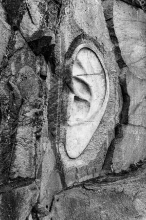 LIPNICE NAD SAZAVOU, CZECH REPUBLIC - DECEMBER 31, 2018: Bretschneiders Ear scuplture in old granite rock quarry near Lipnice Castle. Black and white image.のeditorial素材