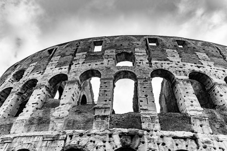 Colosseum, Coliseum or Flavian Amphitheatre, in Rome, Italy. Detailed view of facade. Black and white image.の写真素材