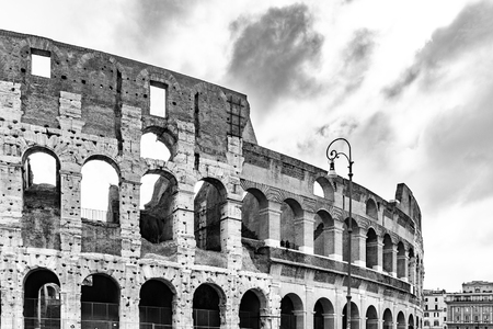 Colosseum, Coliseum or Flavian Amphitheatre, in Rome, Italy. Detailed view of facade. Black and white image.の写真素材