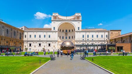 VATICAN CITY - MAY 07, 2018: Sphere within Sphere - bronze sculpture by Italian sculptor Arnaldo Pomodoro. Courtyard of the Pigna of Vatican Museums, Vatican City.のeditorial素材