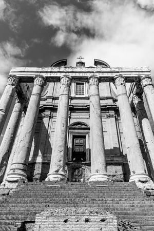 Temple of Antoninus and Faustina, Roman Forum, Rome, Italy. Black and white image.の写真素材