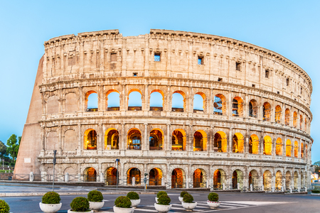 Colosseum, or Coliseum. Illuminated huge Roman amphitheatre early in the morning, Rome, Italy.の写真素材