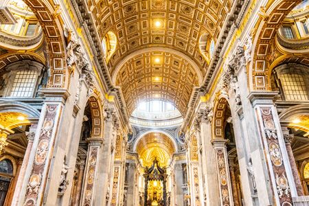 VATICAN CITY - MAY 07, 2019: Ray of light in interior of the Saint Peters Basilica, Vatican in Rome, Italy.のeditorial素材