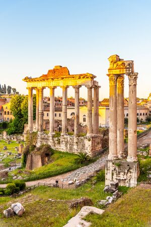 Roman Forum with ruins of Temple of Saturn on sunny summer morning. Antique ruins in Rome, Italy.の写真素材